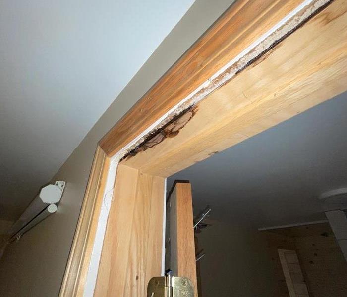 Rotting door frame due to water damage